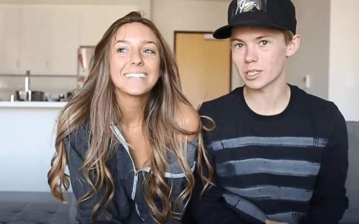 Tanner Fox and Taylor Alesia making YouTube vlogs.